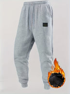 Men's 4-Color Options Compatible Sweatpants - Stretch Knit Joggers with Drawstring Waist, Belt-Like Design | Solid Color Options Black, Gray, Navy, White | Elastic Cuffs and Smooth Legs, Suitable for Gym, Casual, Casual Attir